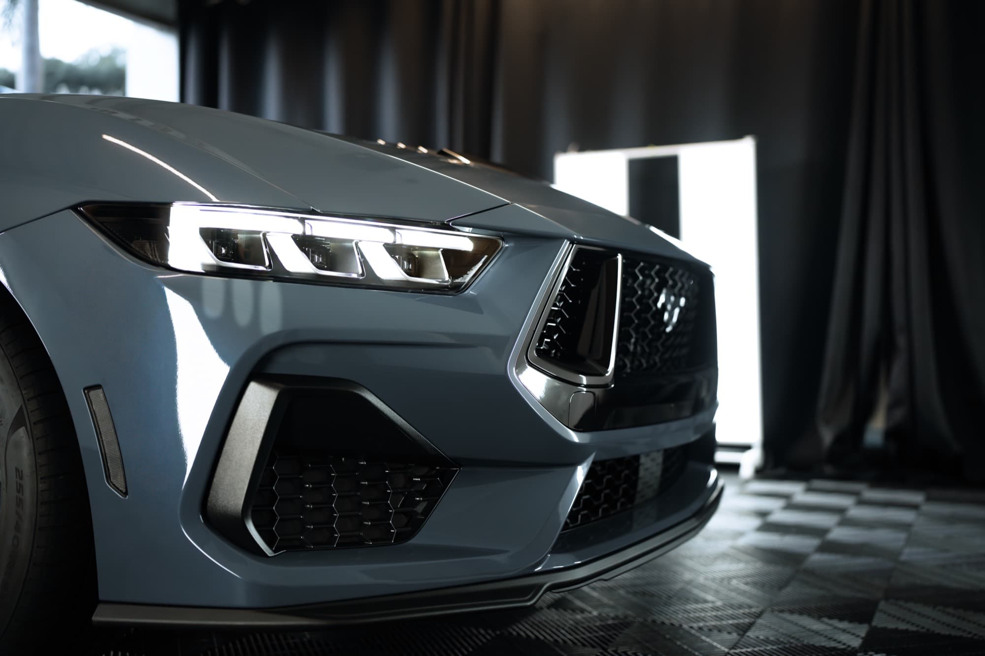 Front three-quarter view of the Mustang GT in the Royal Car Care studio