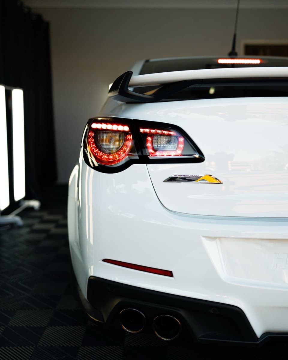Rear of the HSV GTS showing the tail lights and supercharged badge